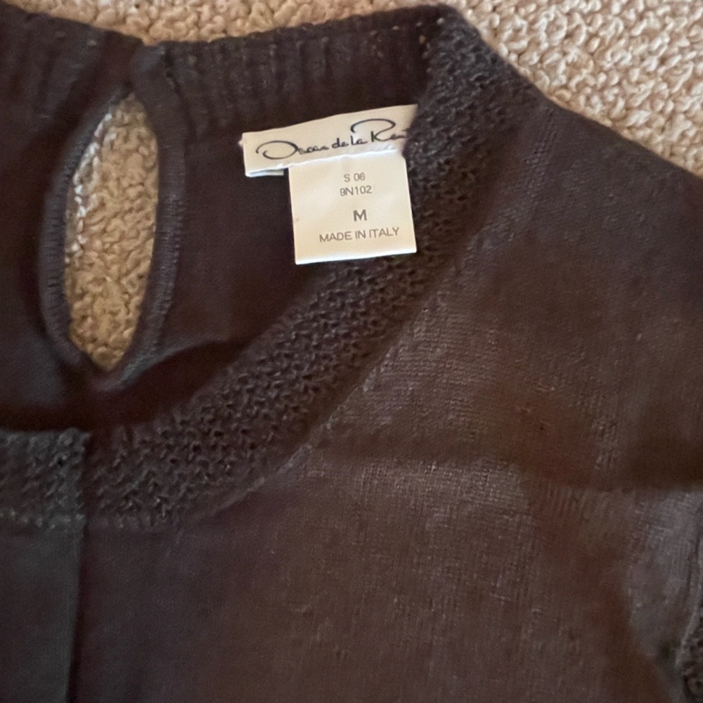 Oscar de la Renta sleeveless sweater.